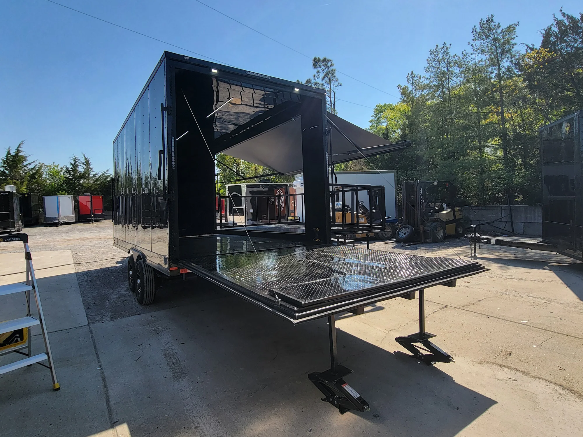 8.5' X 18' Custom Enclosed Stage and Event Deck over Blackout With Black Trim - Image 8