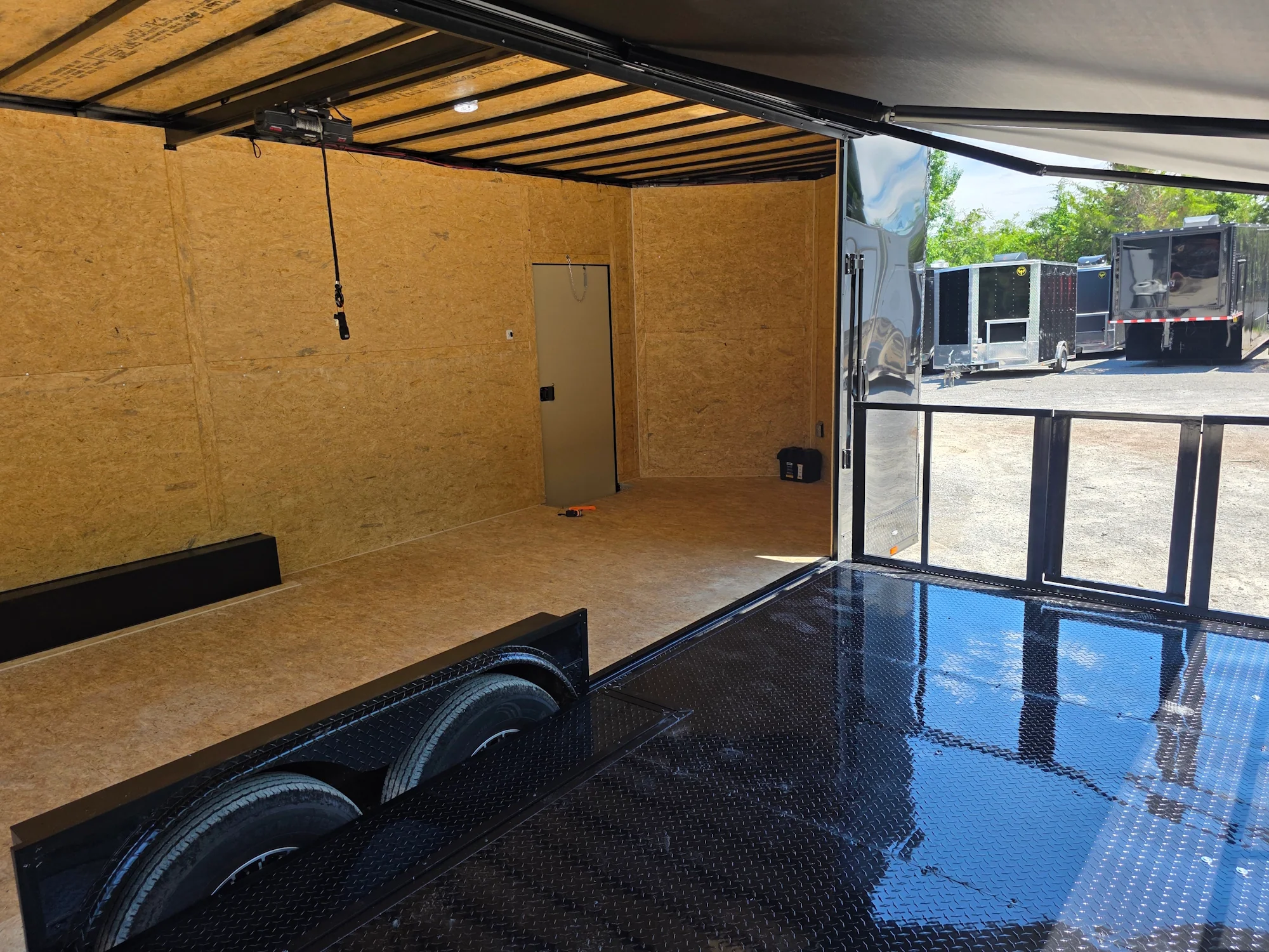 8.5' X 24' Black Custom Stage and Marketing Showcase Enclosed Trailer - Image 18