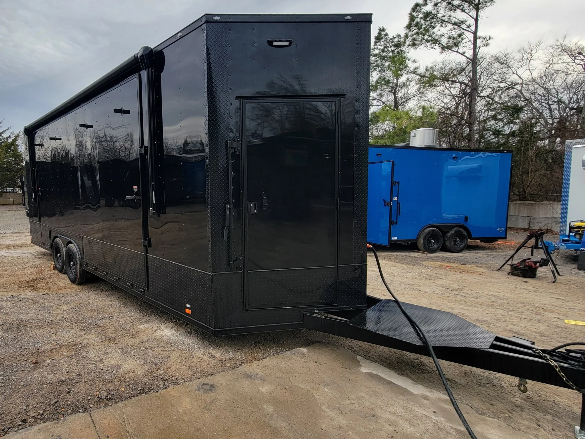 Custom Enclosed 8.5 X 24 Stage Trailer Black With Black Out Trim and Awning - Image 15