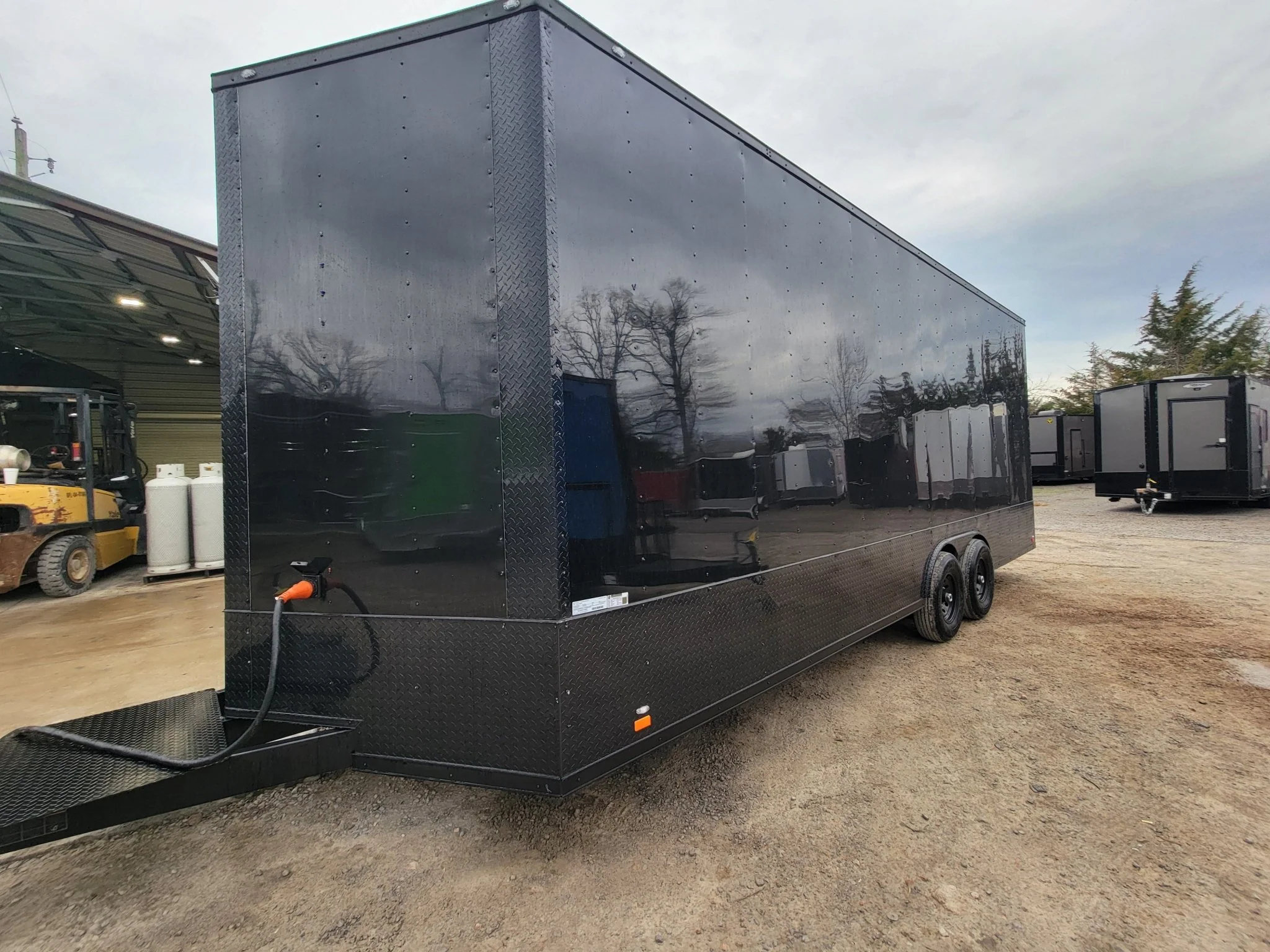 Custom Enclosed 8.5 X 24 Stage Trailer Black With Black Out Trim and Awning - Image 22
