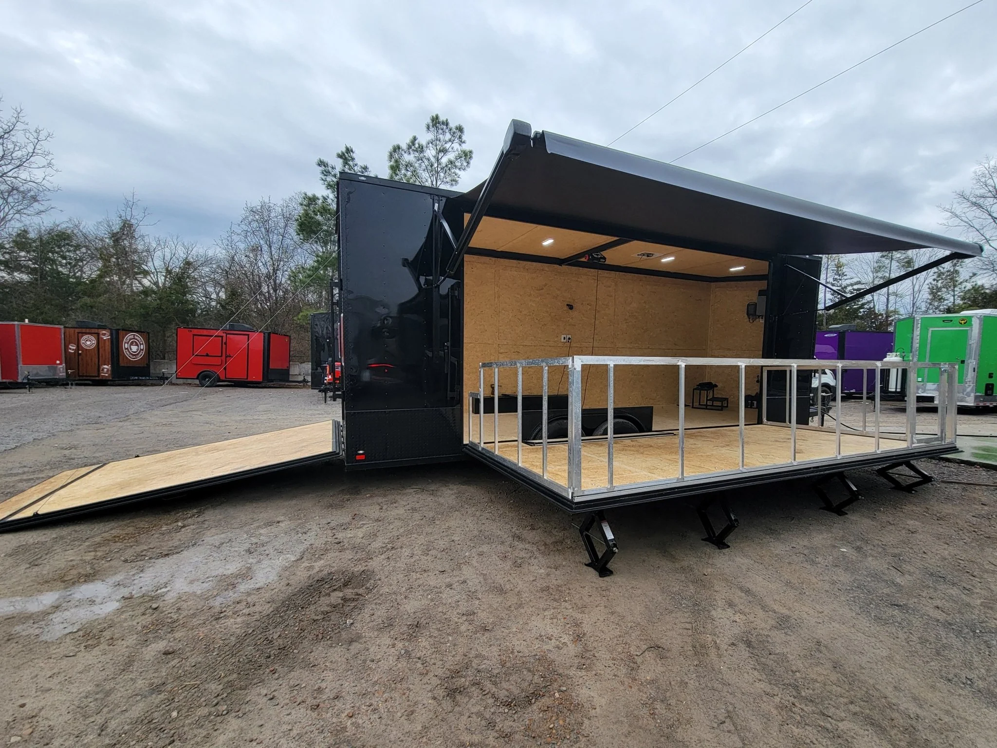 Custom Enclosed 8.5 X 24 Stage Trailer Black With Black Out Trim and Awning - Image 4