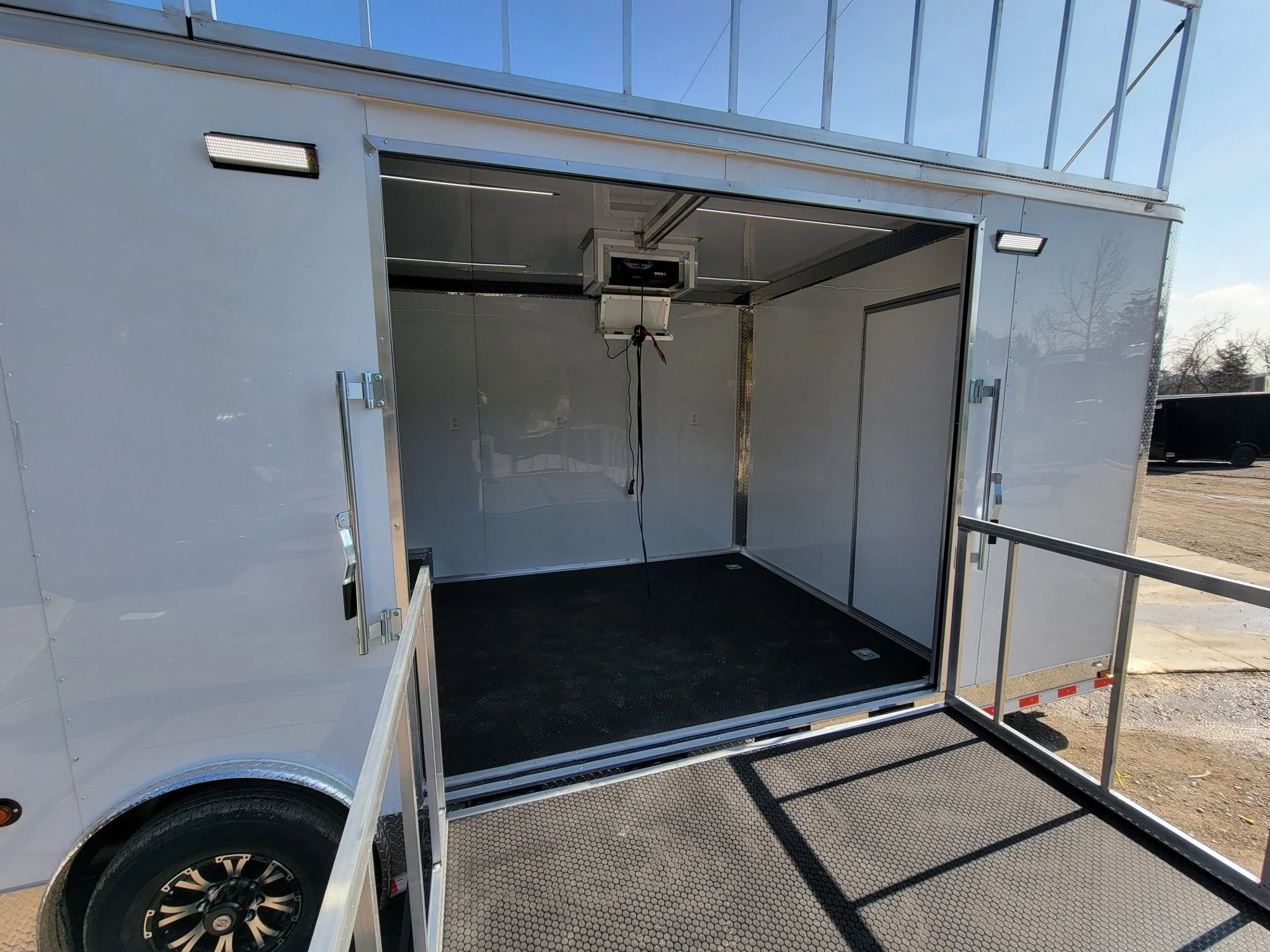 8.5' X 28' Custom Enclosed Marketing and Event Stage Trailer - Image 24