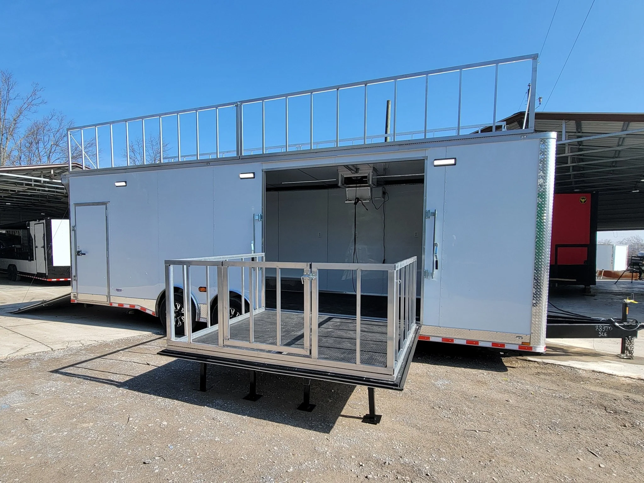 8.5' X 28' Custom Enclosed Marketing and Event Stage Trailer - Image 29