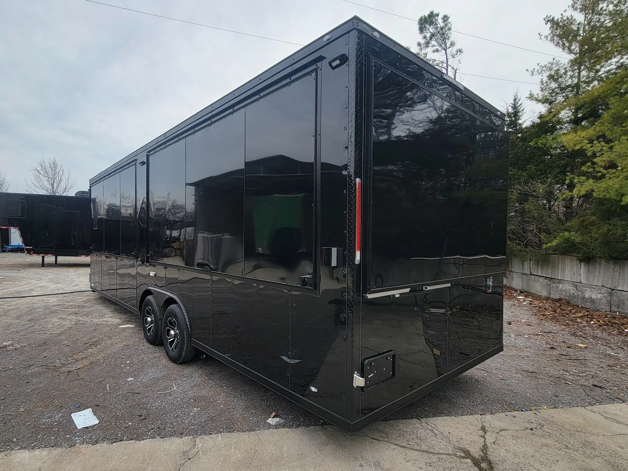 8.5' X 26' Custom Enclosed Merchandise and Marketing Trailer with Black Out Trim - Image 8